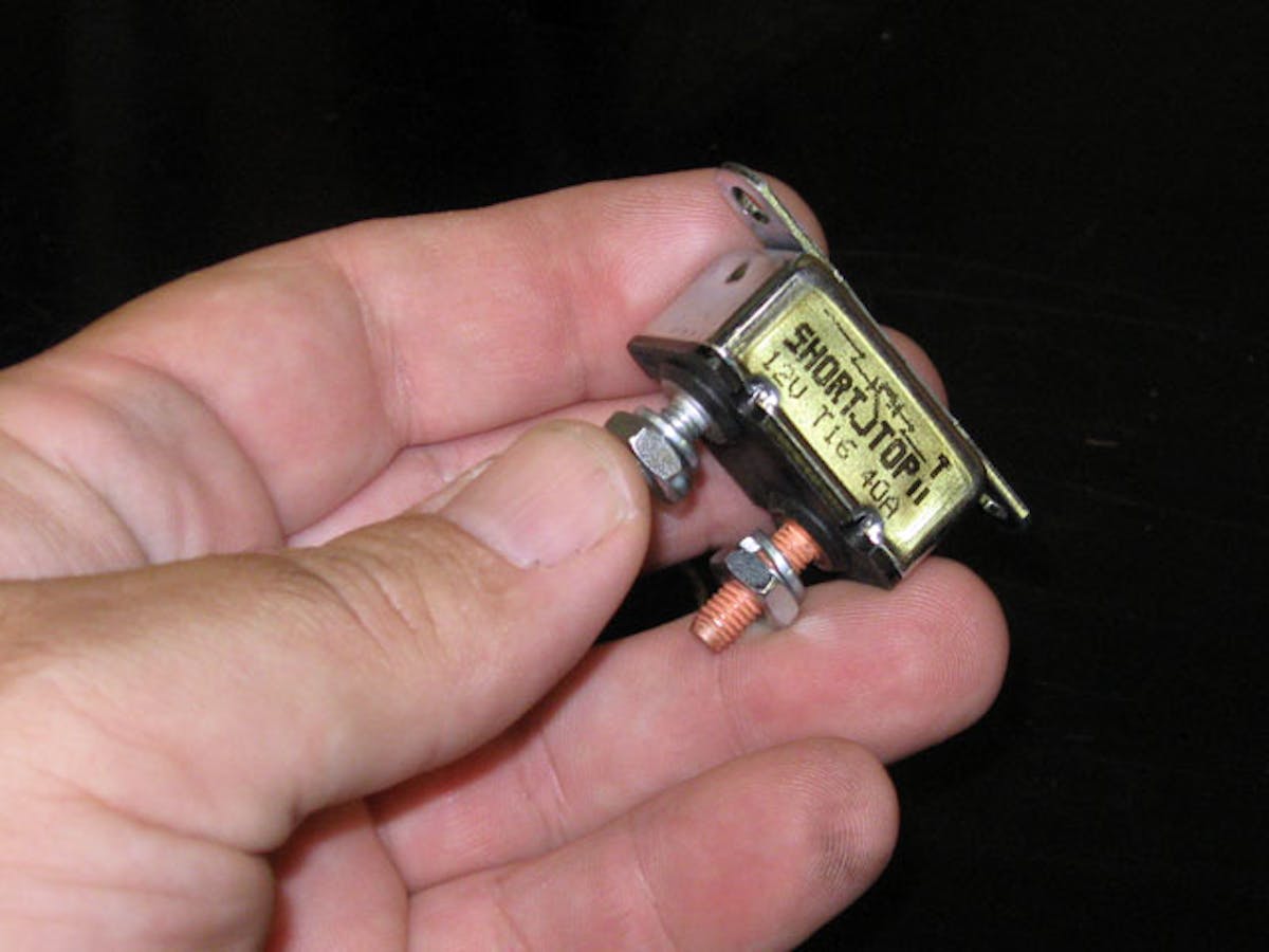 IMG_3196 Individual circuits are protected by 10-amp fuses, the relay has its own 5-amp fuse, and the main power supply is isolated via this 30-amp circuit breaker. If you have a healthy respect for the damage an electrical fire can cause, this setup is serious peace-of-mind.