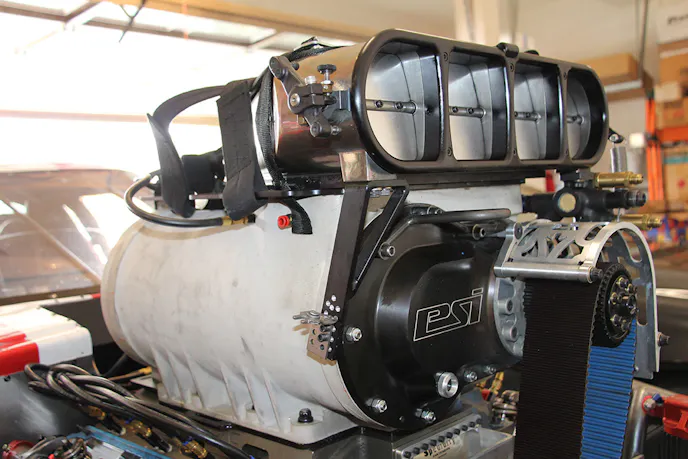 The foundation for making enough power to break records lies in the blower. Dan stepped up to C-Rotor PSI blower which initially made the Viper too violent. The first complete pass down the track with the new blower was the record setting pass.