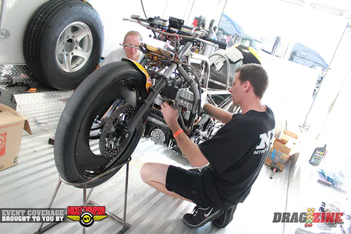 I caught up with Ashley Owens swapping a set of pistons into team mate Eric McKinney’s bike. Ashley had taken a year off after winning the 2011 Pro Extreme Motorcycle championship to crew chief on McKinney’s bike, who won the 2012 title, his first with the ADRL. They have two bikes here this weekend.