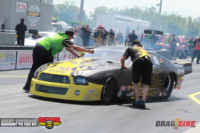 Danny Lowery completed his burnout but was found to be leaking oil while backing up and pushed off. There was some downtime for cleanup, he should be back later today for another attempt.