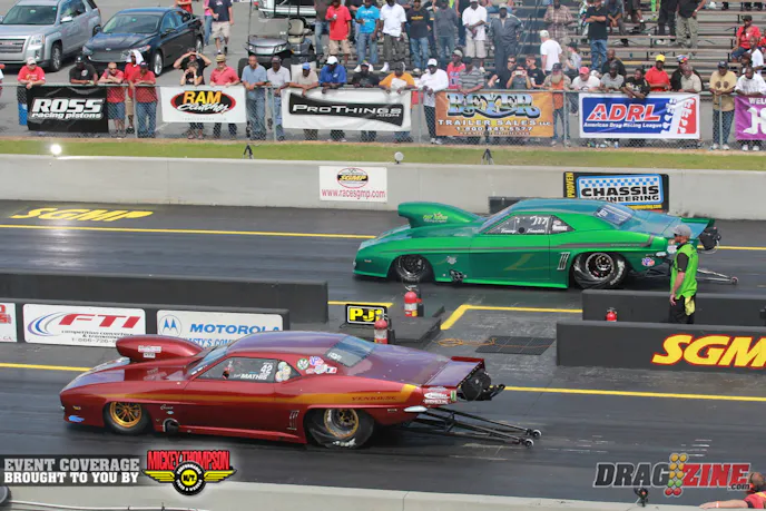 Robert Mathis (near lane) is qualified second with a 3.875 from his second round run where he had high mph for the round with a195.62. Mathis runs a Reher Morrison big Chevy prepped at Nelson Competition. Mike Valerio has come on board to get the car set up and race ready and Mathis is also running the new MVM carbon fiber wheelie bars.