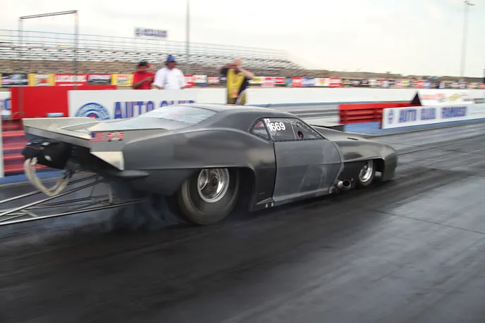 Steve Bothwell says the team is "just testing" their Camaro this weekend, but driver Rick Snavely wasn't playing around, fighting brutal tire shake on two consecutive passes on Friday.
