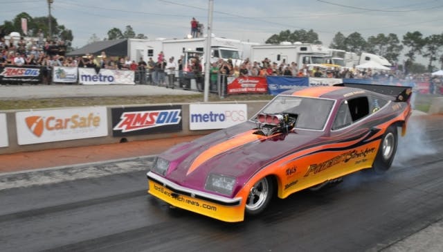 Peter Gallen nearly put it in the wall, but he was able to save it and get the Funny Car win