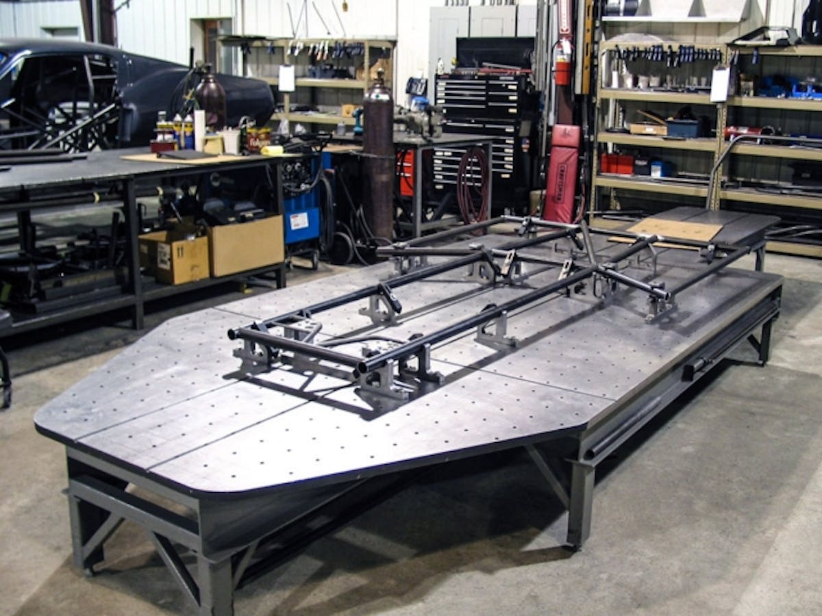 Day one and the start of the '68 Camaro build for Tyler and Brian Hard. Chassis surface table is precision ground to within .001-inch. This allows for the foundation of the car to be built perfectly flat. The entire chassis will be final welded while clamped to this fixture.