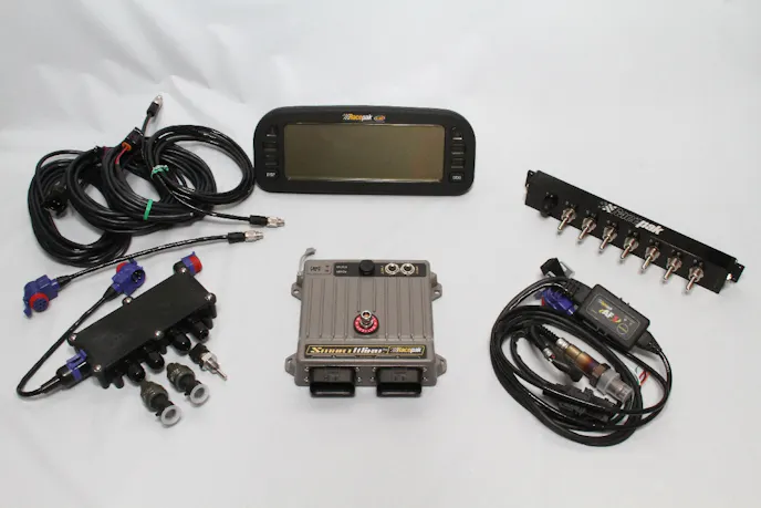 We used a complete SmartWire system from Racepak and added on their UDX dash and AF-1 wideband controller.