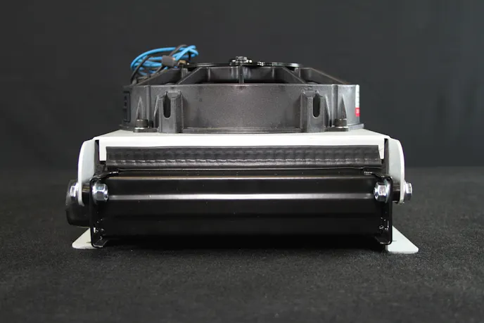 The remote mounting capability of the Derale Hyper-Cool unit allows one to mount the cooler away from the cluttered engine compartment (and the heat that exists there) and place it in a more suitable location. The stacked plate designed of the heat exchanger keeps this unit compact, yet efficient and durable.