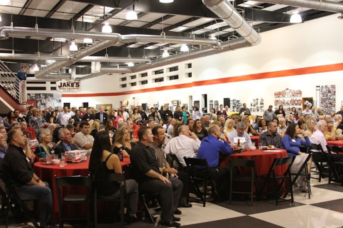 Vic's garage turned into a movie theater where the company's story was told on the big screen.