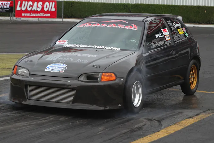 It might be wrong-wheel-drive, but the lone Honda on the track today is running low tens...