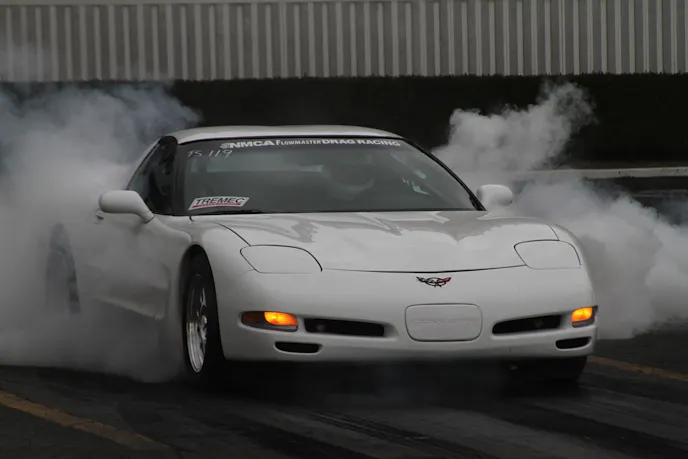 Ed Crow is stacking nitrous on top of a pair of rear-mount turbos in search of an eight-second timeslip in True Street. After fighting electrical gremlins yesterday that led to an Exxon Valdez incident in the staging lanes when the turbo scavenge pump stopped working, it seems like he's got things better sorted today with a 9.40 pass in time trials.