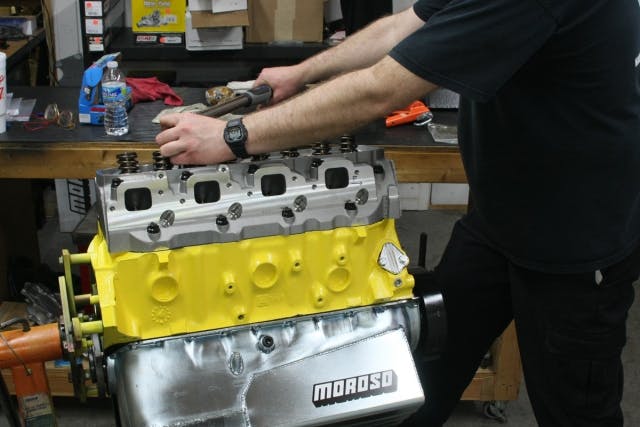 Torquing the cylinder head is done in steps to ensure the fastener is stretched to provided the proper torque load on the gasket. An electronic wrench is used for accuracy.