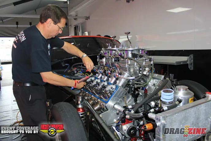 Pro Mod racer Dan Stevenson is running this weekend, when I stopped by this morning Charles Carpenter was going over the valves on the Reher Morrison 872 which is fed by a Switzer Dynamics nitrous system.