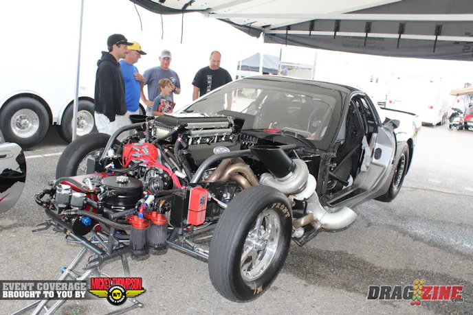 Paul Major rolled in yesterday with his somewhat controversial 2002 Corvette built by DMC Race Cars Inc. It has been updated in the off season with a switch from the rear mount turbos and a 580 ci, 5 inch bore space big Chevy from Joe Newsham’s J&E Racing. The team tested just the other day at MIR with good results, running a 4.53 then a 4.41 before a couple of minor issues ended their session. Sponsors include J&E Racing, DMC Racing, Rossler, Mickey Thompson and Pro Torque.