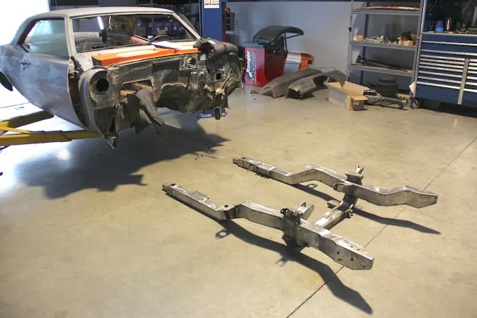 Our new engine had not arrived but we were eager to get the new subframe mounted. So we put the frame in position and bolted it to the chassis.