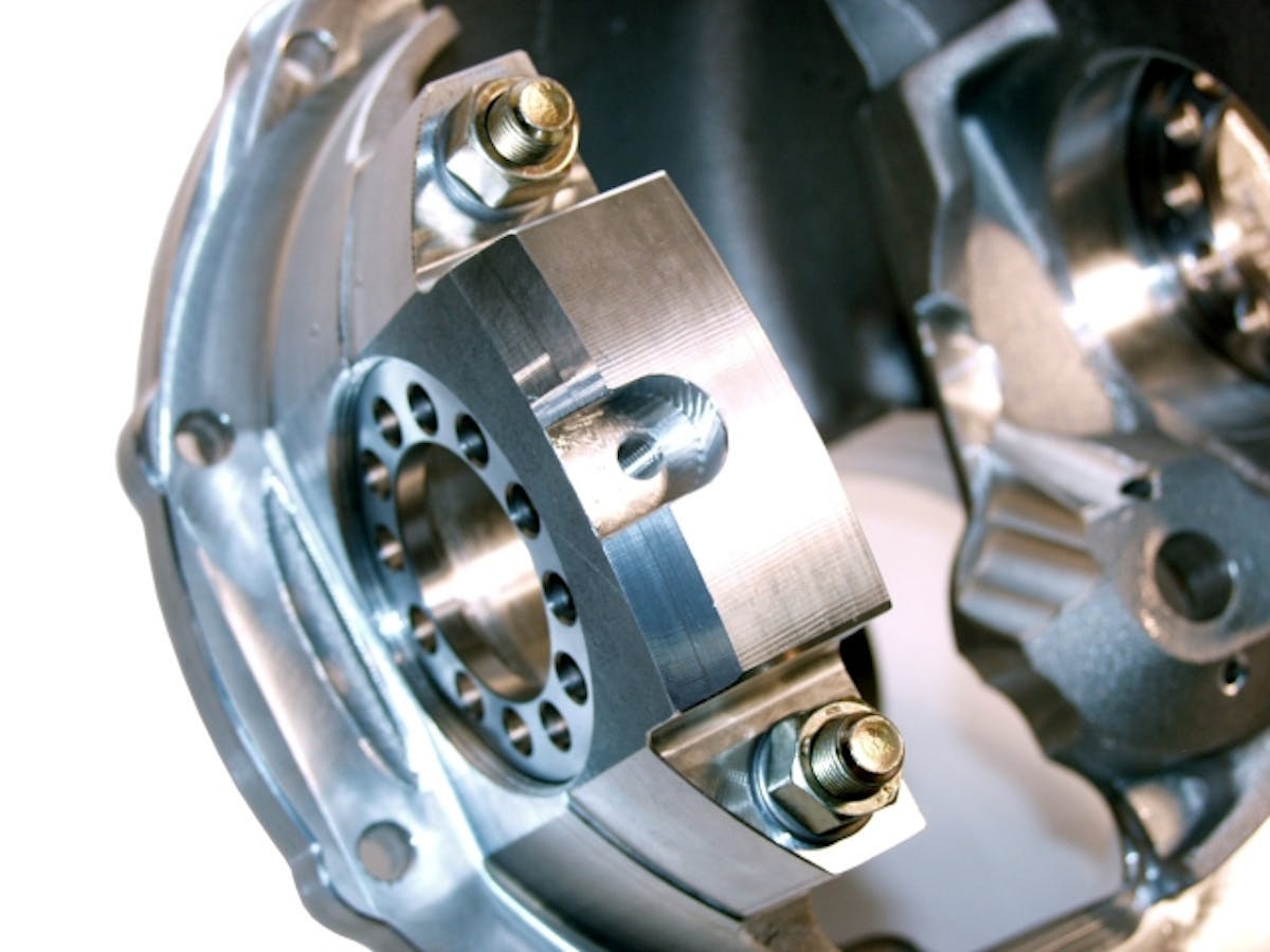 The through-bolt design is one of the great innovations in center section technology. In this type of case, used by virtually all drag racers, the rear caps are bolted straight through to the front of the case, creating a strong bond under the harsh forces that a center section endures.