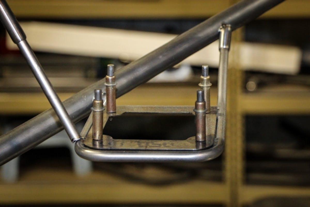 This view shows the Racepak Data Acquisition mount. It is constructed from titanium and attaches to the chassis with sleeves.