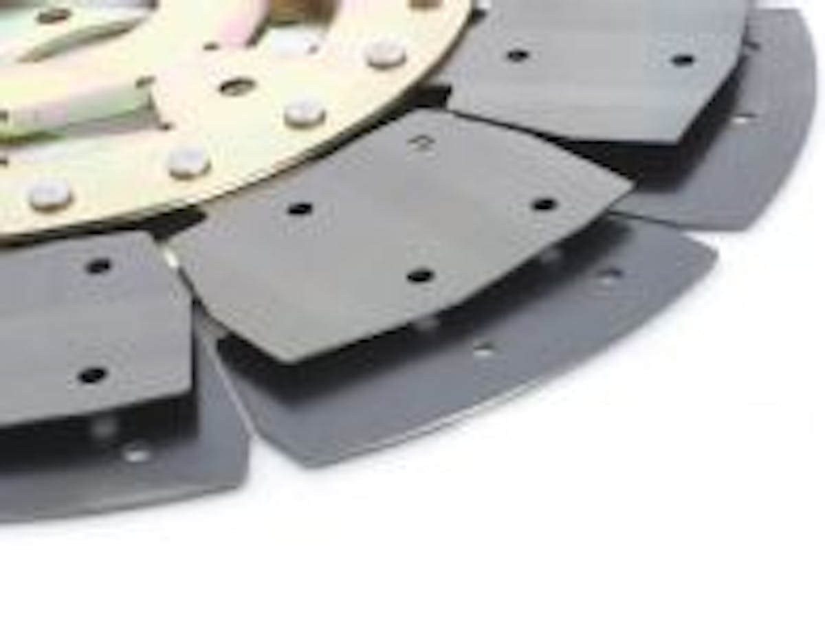 The Marcel spring, shown here, goes between the clutch facings and helps cushion engagement.