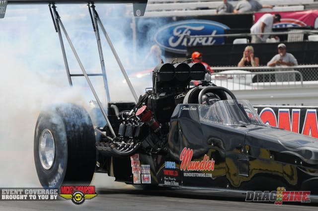 Last spring, Northwest Top Alcohol Dragster racer Shawn Cowie was critically injured in a highway traffic accident when the motorcycle he was riding was struck by a vehicle in Nashville, Tenn. Cowie, who nearly lost his life in the accident, not only persevered and recovered from his injuries, but was able to step back into the cockpit of his dragster this season, winning a Division 6 race in Woodburn, Ore. and following it with a big win at the NHRA Northwest Nationals in Seattle. Cowie and company are here in Indy this weekend chasing their first U.S. Nationals victory.