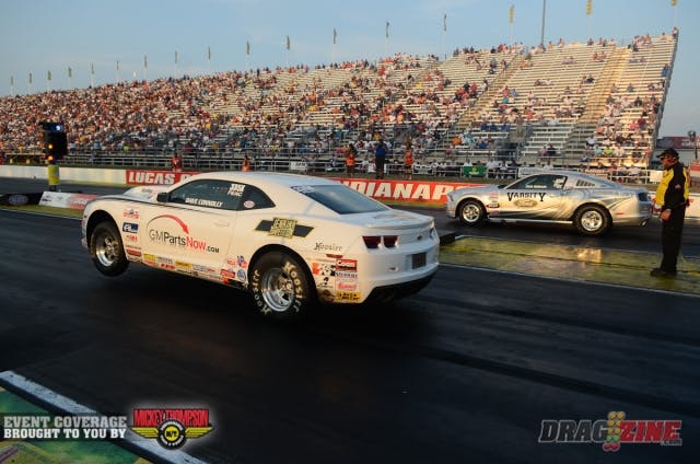 Chris Holbrook claimed the Factory Stock Showdown prize in his Cobra Jet Mustang under the lights here at Indy, as final round opponent Dave Connolly, in the Victor Cagnazza-owned COPO Camaro in the near lane fouled out, handing the automatic win to the Michigan native.