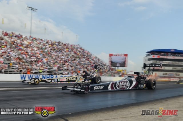 Brittany Force, the current No. 1 qualifier on Top Fuel, who made her way into the Traxxas Nitro Shootout by way of the fan vote, posted the best elapsed time of the opening round with a 3.86 but was second off the starting line, allowing Shawn Langdon to squeak by with his 3.87.