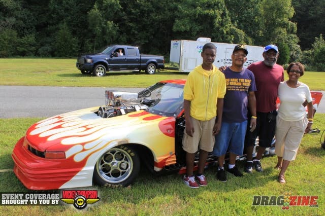 Roaming the pits this morning on the pro side I found Ray Jackson parked in the back today with his top Sportsman Old Cutlass based out of Philadelphia. He runs division one NHRA Top Sportsman with the 598 cubic inch big Chevy built by Budds Motorsports (BMS) and topped with a 14/71 blower. He purchased the Chaos chassis used and swapped in his engine from the 81 Camaro he ran previously. Crew includes from let to right grandson Jahlil Jackson, crew chief Gary Bailey, Ray and Theresa Jackson. They were here last year to enjoy the show and decided to come and race this year. 