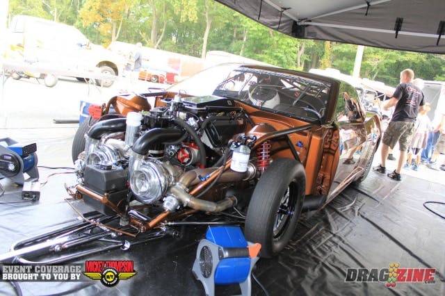 Joe Copson is back after some time off and sendign the engine to Pro Line for a freshen up. He has a new two speed TH 400 transmission from M&M Transmissions and changed the rear gear ratio to work with the two speed. They have not tested the car prior to the event and Gary Naughton is on hand to get it sorted out.