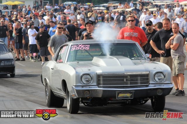 Audry McGrane purges the nitrous as Steve Johnson from Induction Solution looks on. She is currently 34th and not qualified with a 5.41 @ 137 with a soft launch.