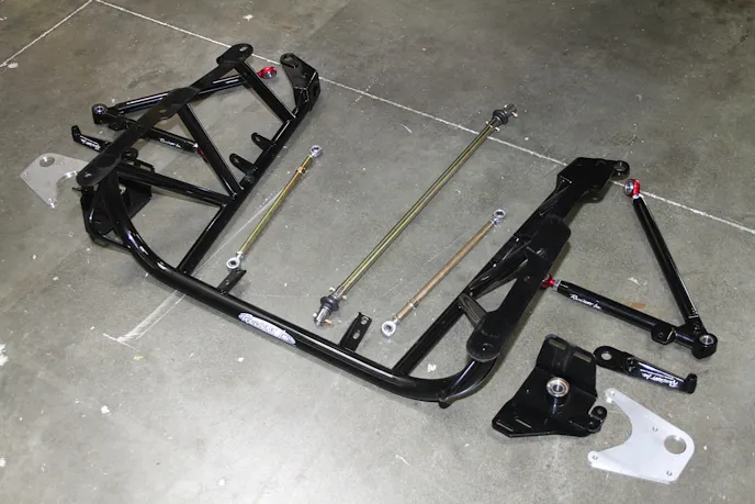 The Racecraft K-member that will serve as the nucleus of our strut and spindle mount wheel/brake installation.