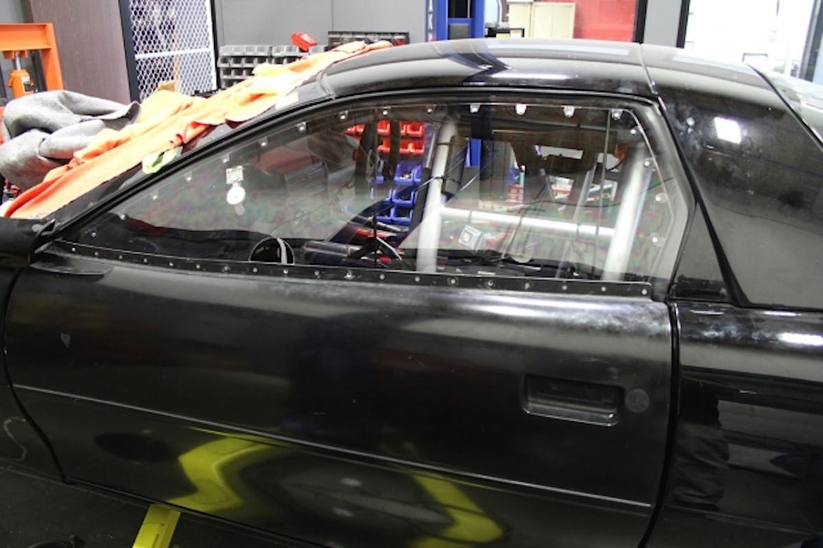 Our good friends at Optic Armor Performance Windows hooked us up with a set of their lightweight, highly durable polycarbonate lexan side windows for the project, allowing us to shed some additional weight and take on an added degree of safety.