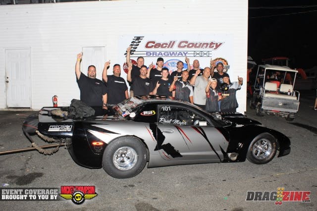 Paul Major and the DMC crew worked hard this weekend qualifying second in Outlaw Drag Radial and setting low ET in the semis against Phil Hines woth a 4.300 @ 188 MPH. While testing with Eric Lefarrier just last Friday the engine dropped a valve. it was dropped off Sunday to J&E Performance for repairs and delivered to the track for the weekend where the crew installed the fresh big Chevy. He met with Dwayne Gutridge in the finals running a 4.369 @ 184 to get around Gutridge's better .025 light and the win.