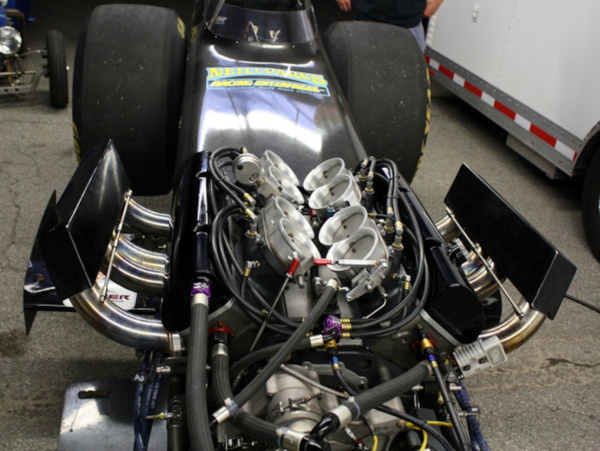 A 387 inch small block with cast iron heads and block that runs in the 6 second zone at over 200 mph.