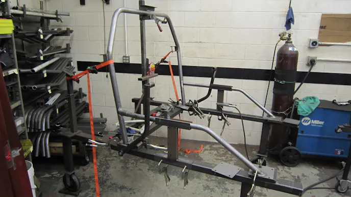 The roll bar is fabricated on an assembly jig at Maximum Motorsports to ensure the roll bar will fit perfectly during installation.