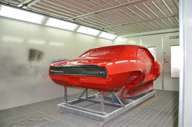 Paint has finally been applied and he's now in the finishing stages of the build!