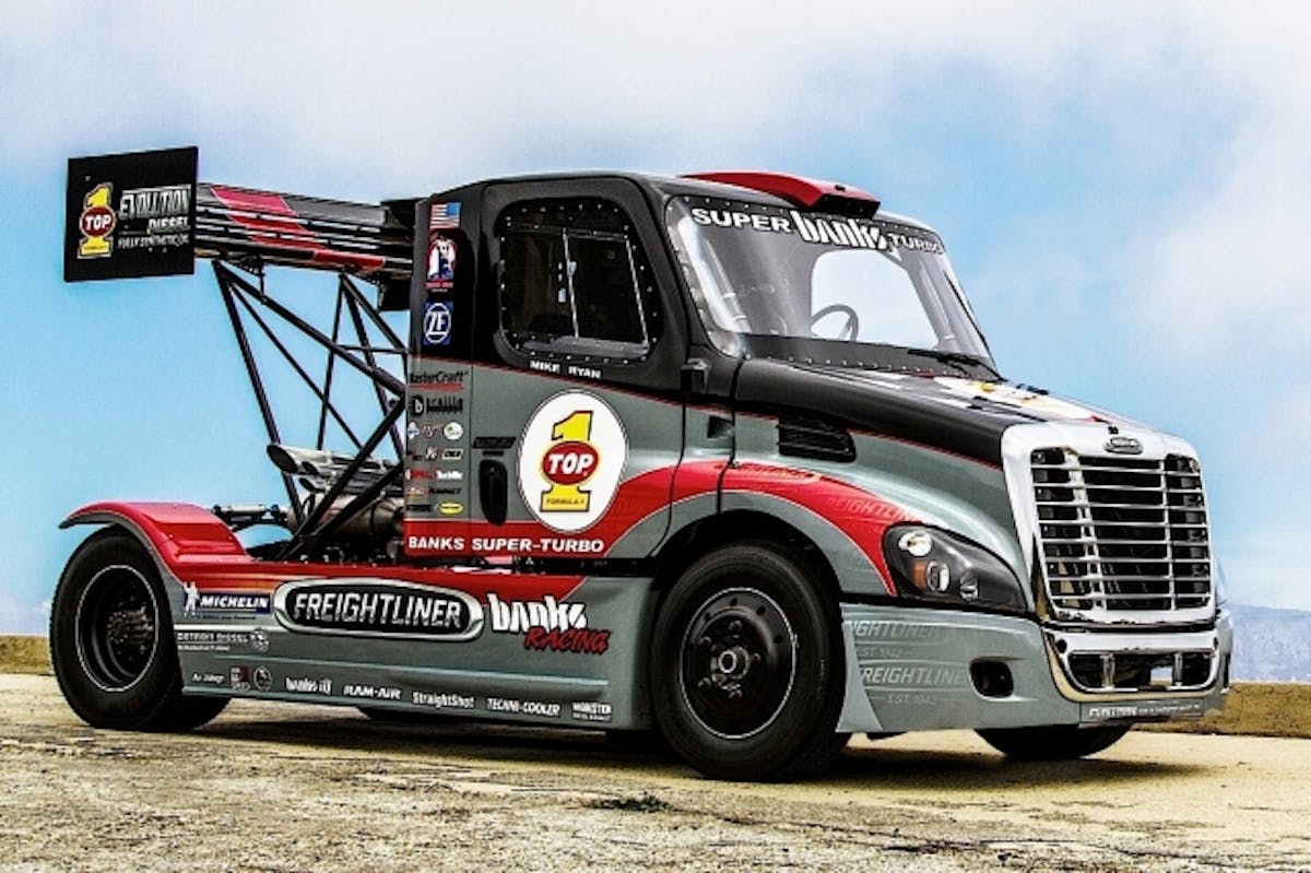 Mike Ryan's Freightliner powered by a Banks Super-Turbo 14.0L Detroit Diesel was just 10 seconds shy of breaking the world record at Pike's Peak. The run was in the rain, snow and fog with heavy washout.