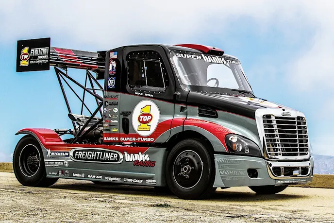 Mike Ryan's Freightliner powered by a Banks Super-Turbo 14.0L Detroit Diesel was just 10 seconds shy of breaking the world record at Pike's Peak. The run was in the rain, snow and fog with heavy washout.