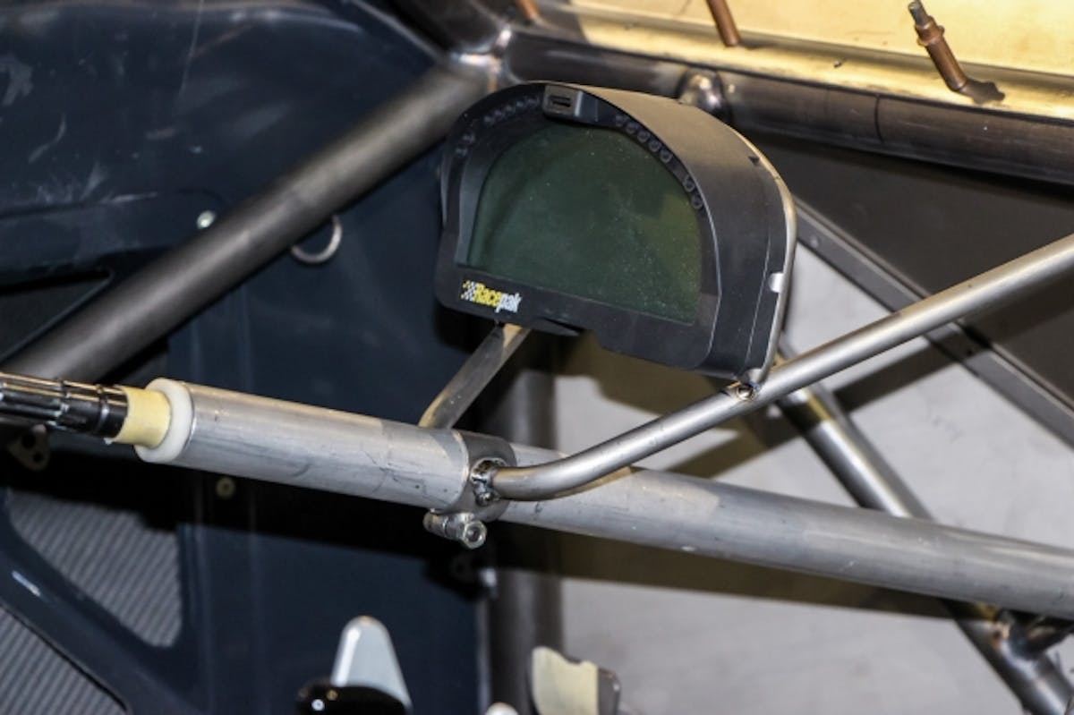 The Racepak IQ3 dash installed with a titanium mount. This is the newest dash from Racepak and the TMRC team likes it for its programming options and the built in shift lite LED’s.