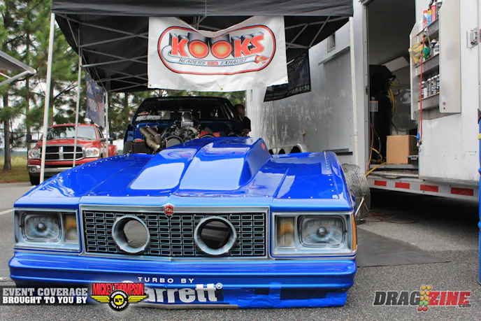 ADRL Pro Drag Radial champion Mark Micke is here sporting some new headers from Kooks and new exhaust housings from Tial Sport on the twin Garrett turbos in Jason Carter’s Malibu. The team is getting some maintenance in this morning after have the car on the road for several weeks.