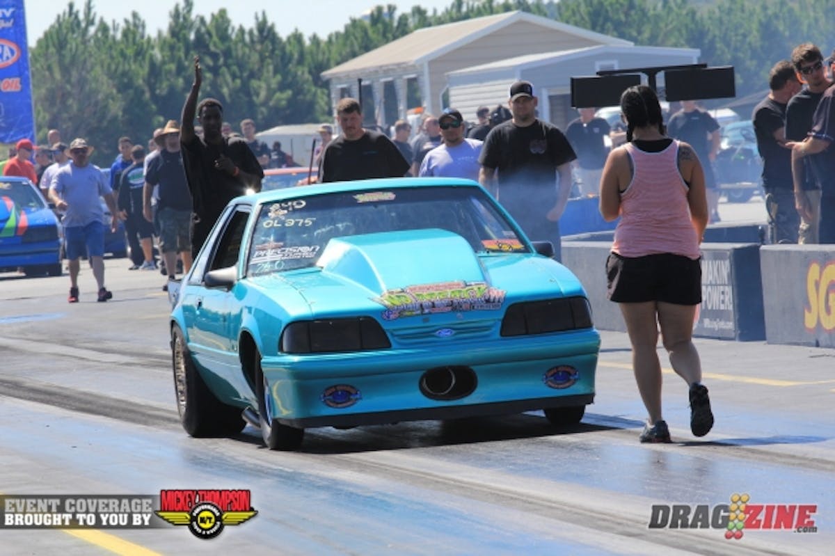 David Pearson is knocking on the 4.40's in Mac Fab/Precision Turbo Outlaw 275 with a 4,51 at 167 MPH earning number one qualifier. Pearson runs a Procharged small block Ford in a 93 Mustang out of Marion, North Carolina.