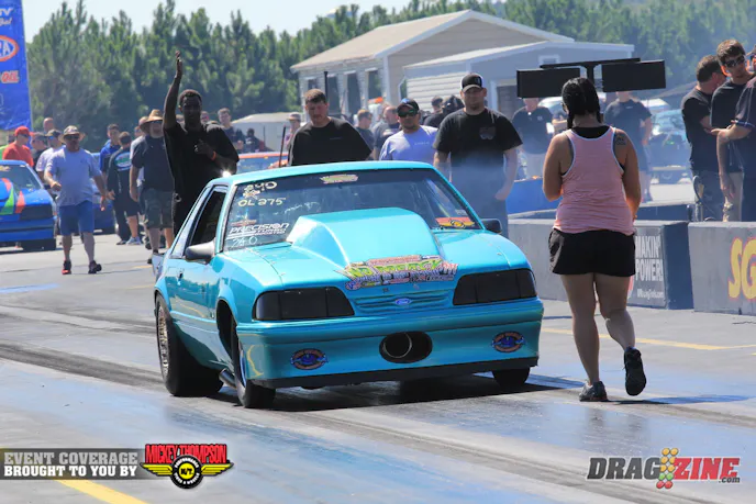 David Pearson is knocking on the 4.40's in Mac Fab/Precision Turbo Outlaw 275 with a 4,51 at 167 MPH earning number one qualifier. Pearson runs a Procharged small block Ford in a 93 Mustang out of Marion, North Carolina.