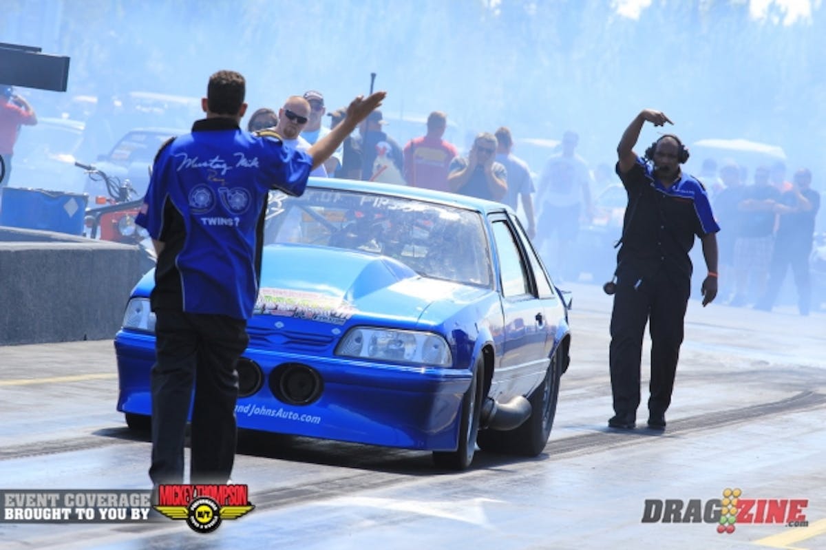Mustang Mike leads Steve Schmidt Competition Engines/Monte Smith/Holley Outlaw Drag Radial with one round in the books with a 4.53 at 169 MPH. The team has struggled with the twin Procharger combo but things are starting to come together now.