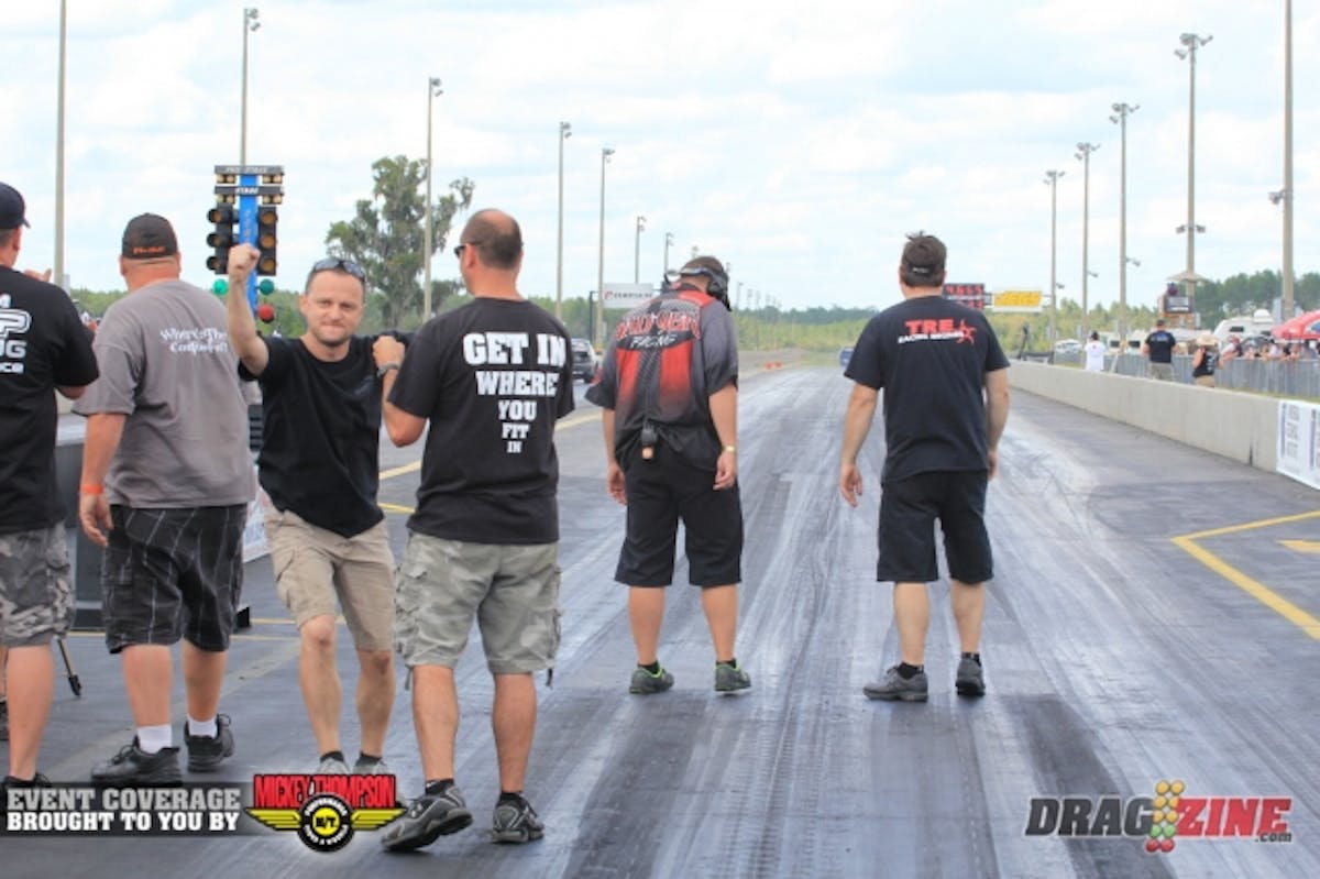 John Kolivas was showing his excitement after a win by Shane Fisher against Brad Medloch in X275. Fisher will face Jason Michalak from the Bad9er crew in the semis.