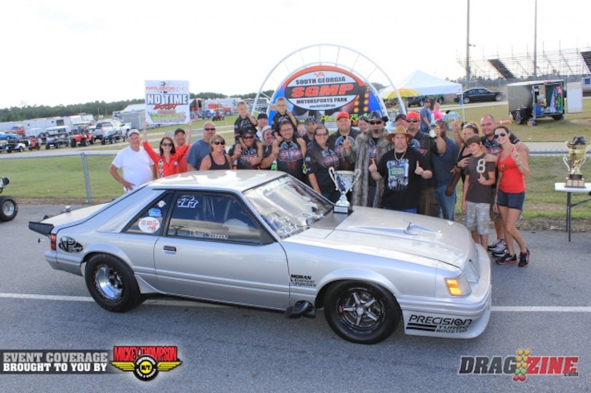 Team SVO got a well earned win in Boost No Time today. Erin Sheffer won a $10.000 KOTS event just two weeks ago but got lose near the finish and wound up into both walls after a great effort to save the car.Car owner Ted Slusarczyk took the car home and sat for a day before his wife and son prompted him to get the car fixed and head here to No Mercy IV. John Weis from Foxrods hung new sheetmetal and painted the car by Saturday. Once home again the team spent most of the next two days around the clock preparing it then headed to Team Z at 5 AM Monday. Dave Zimmerman looked the car over and set up the chassis then they drive straight here winning the Boost grudge race in a great final round with Sheffer riding out a wheel stand for most of the eight mile.