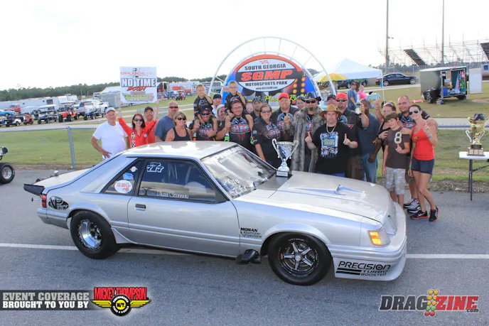 Team SVO got a well earned win in Boost No Time today. Erin Sheffer won a $10.000 KOTS event just two weeks ago but got lose near the finish and wound up into both walls after a great effort to save the car.Car owner Ted Slusarczyk took the car home and sat for a day before his wife and son prompted him to get the car fixed and head here to No Mercy IV. John Weis from Foxrods hung new sheetmetal and painted the car by Saturday. Once home again the team spent most of the next two days around the clock preparing it then headed to Team Z at 5 AM Monday. Dave Zimmerman looked the car over and set up the chassis then they drive straight here winning the Boost grudge race in a great final round with Sheffer riding out a wheel stand for most of the eight mile.