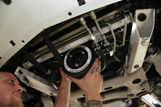 Our Lingenfelter-specific ATI Performance Products-built harmonic damper installs from underneath the car and uses a separate supercharger drive pulley, available for varying levels of boost depending upon your level of modifications.