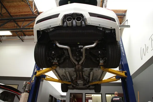 In order to install the new Corsa Performance exhaust, we raised up our CTS-V on the POwer Automedia shop's lift. This can be done in the driveway but the extra room is helpful.