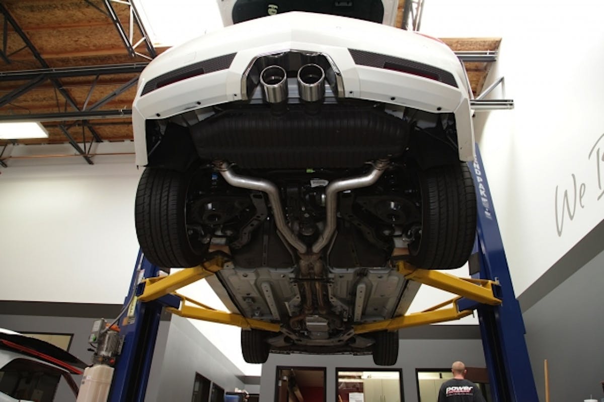 In order to install the new Corsa Performance exhaust, we raised up our CTS-V on the POwer Automedia shop's lift. This can be done in the driveway but the extra room is helpful.