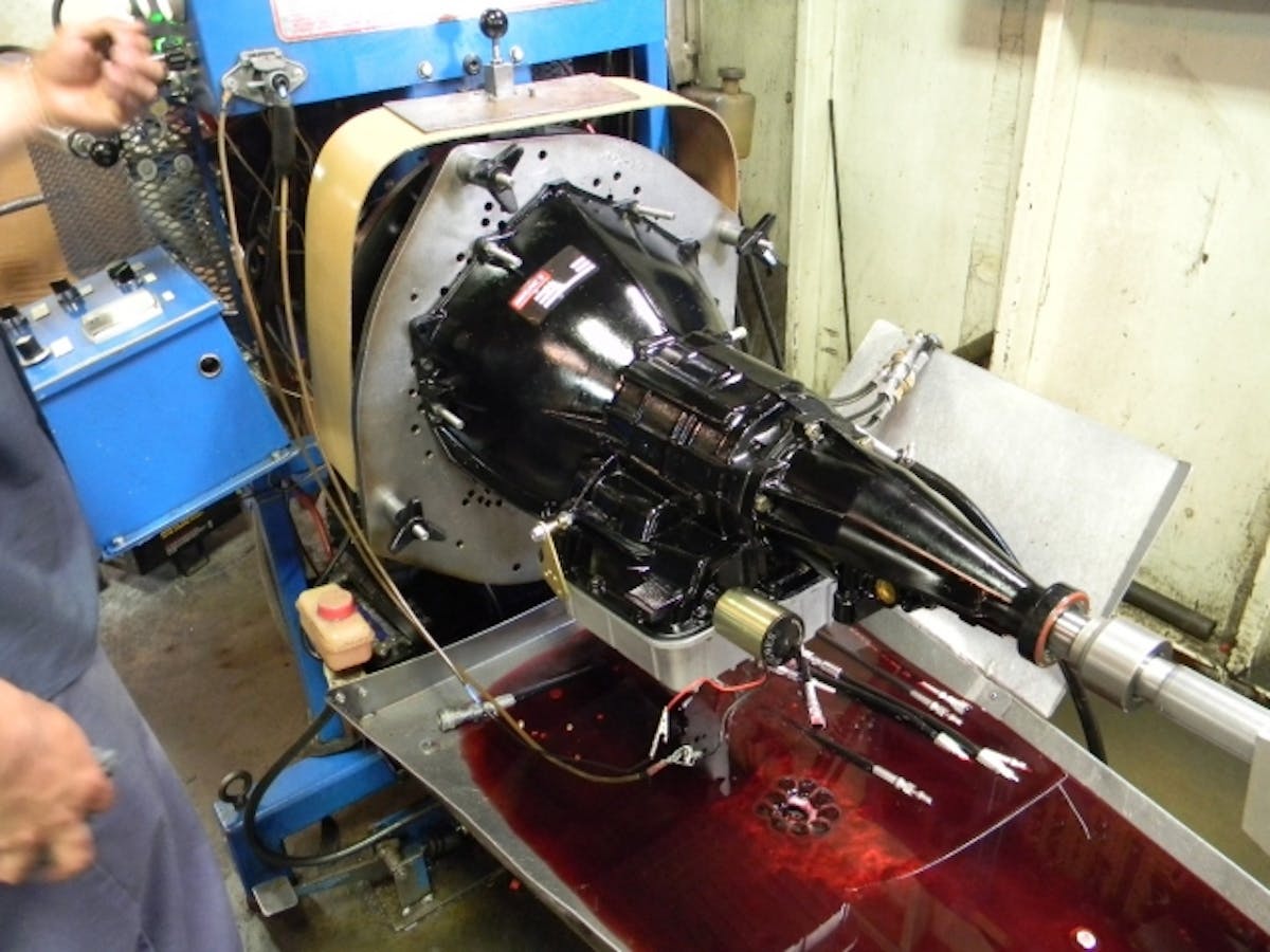 Hughes Performance testing the transmission, as they do with all of their transmission before they're shipped out. The Powerglides undergo at 235 – 255 PSI of line pressure during this test.