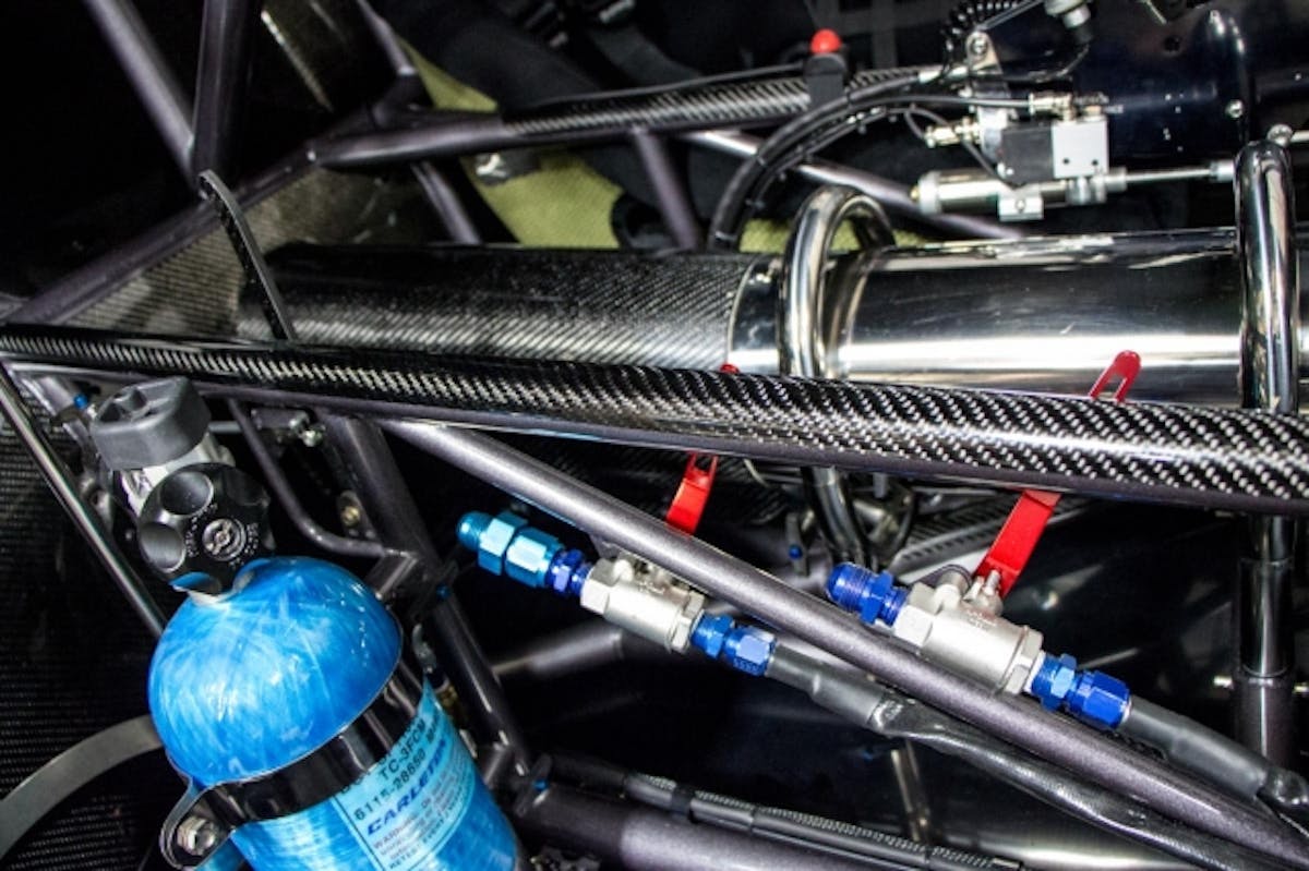 Here's another shot of the interior with the fire bottle installed and the nitrous shutoff valves mounted in place. Large red handles are used – there's no mistaking whether the system is on or off.