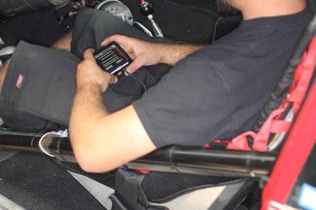 The handheld controller is a display and interface for the user. Completely menu driven, the user inputs information requested by the ecu to set the unit initially. After the initial set-up, the system begins learning the driver's habits and the vehicle requirements by itself.