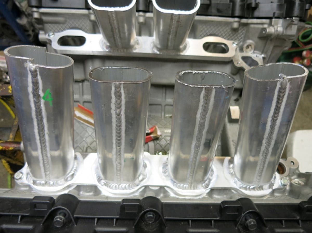 Plenum design was created using a computer simulation process to estimate the engine's airflow requirements.