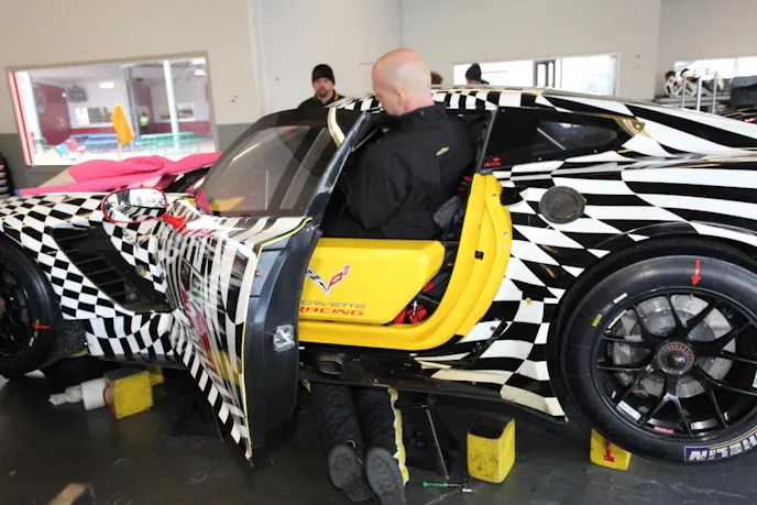 Jan Magnussen looks like his legs have gone through the floor and twisted!